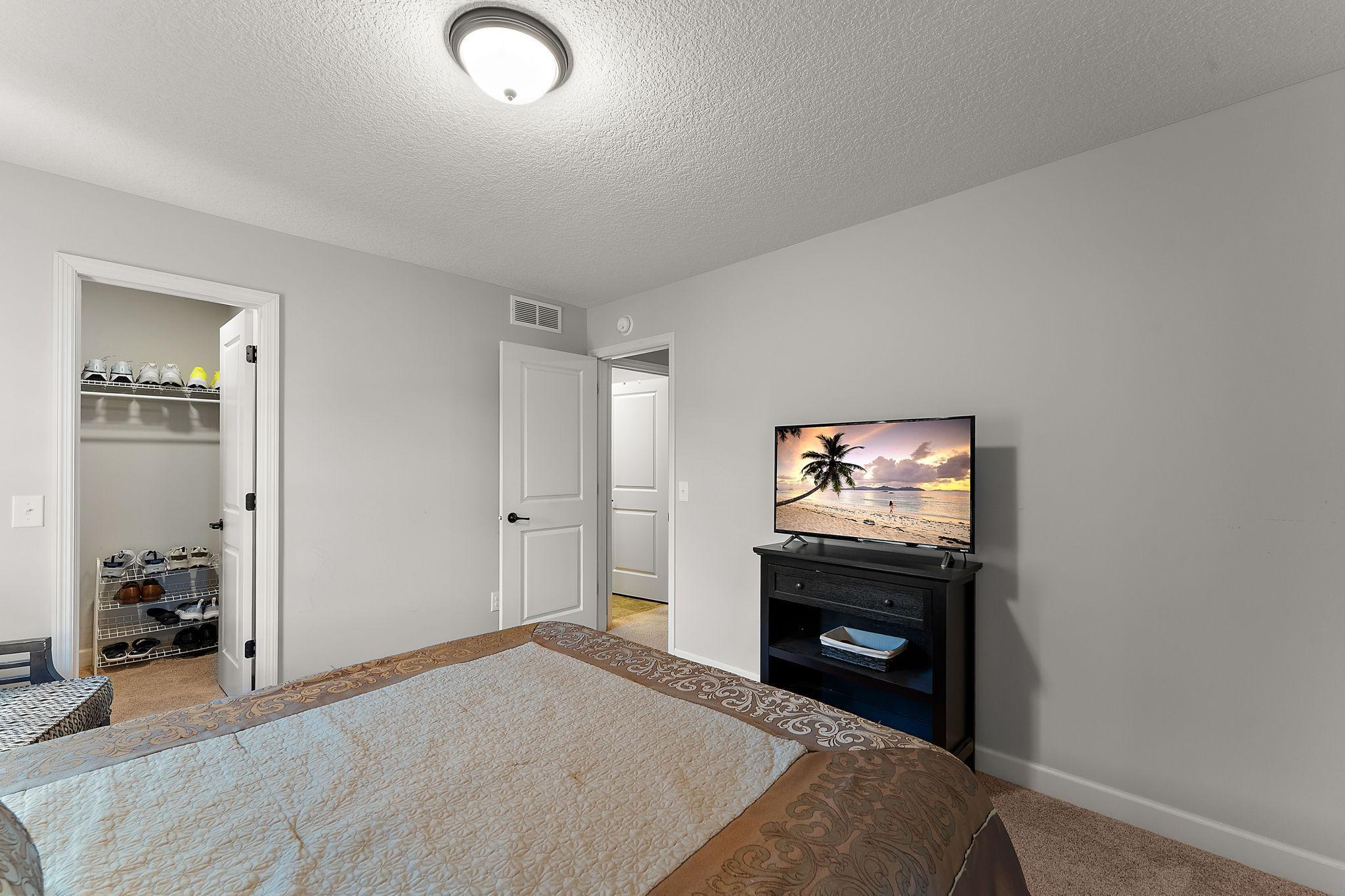 All upper level bedrooms have walk-in closets