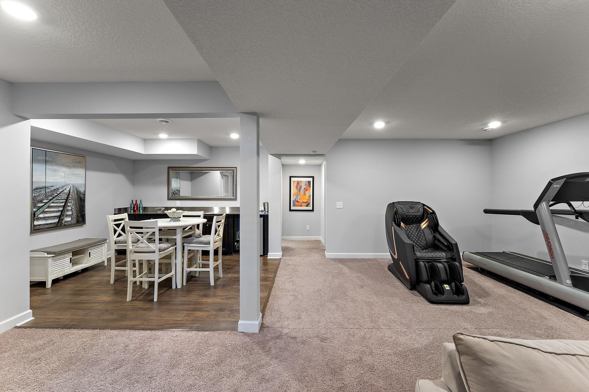 Large space for exercise equipment, pool table or playroom