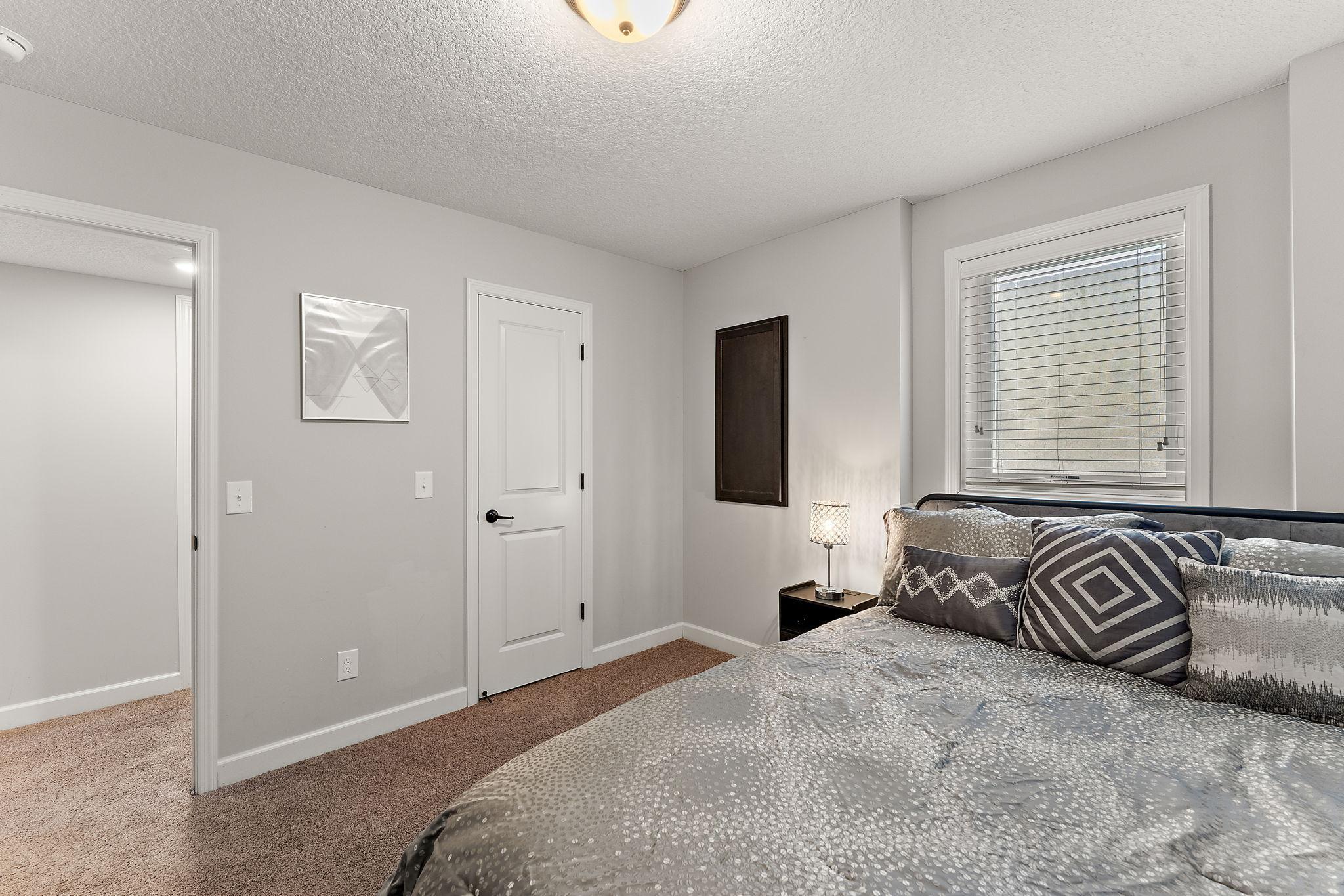 Large closet, bedroom is located near the bathroom
