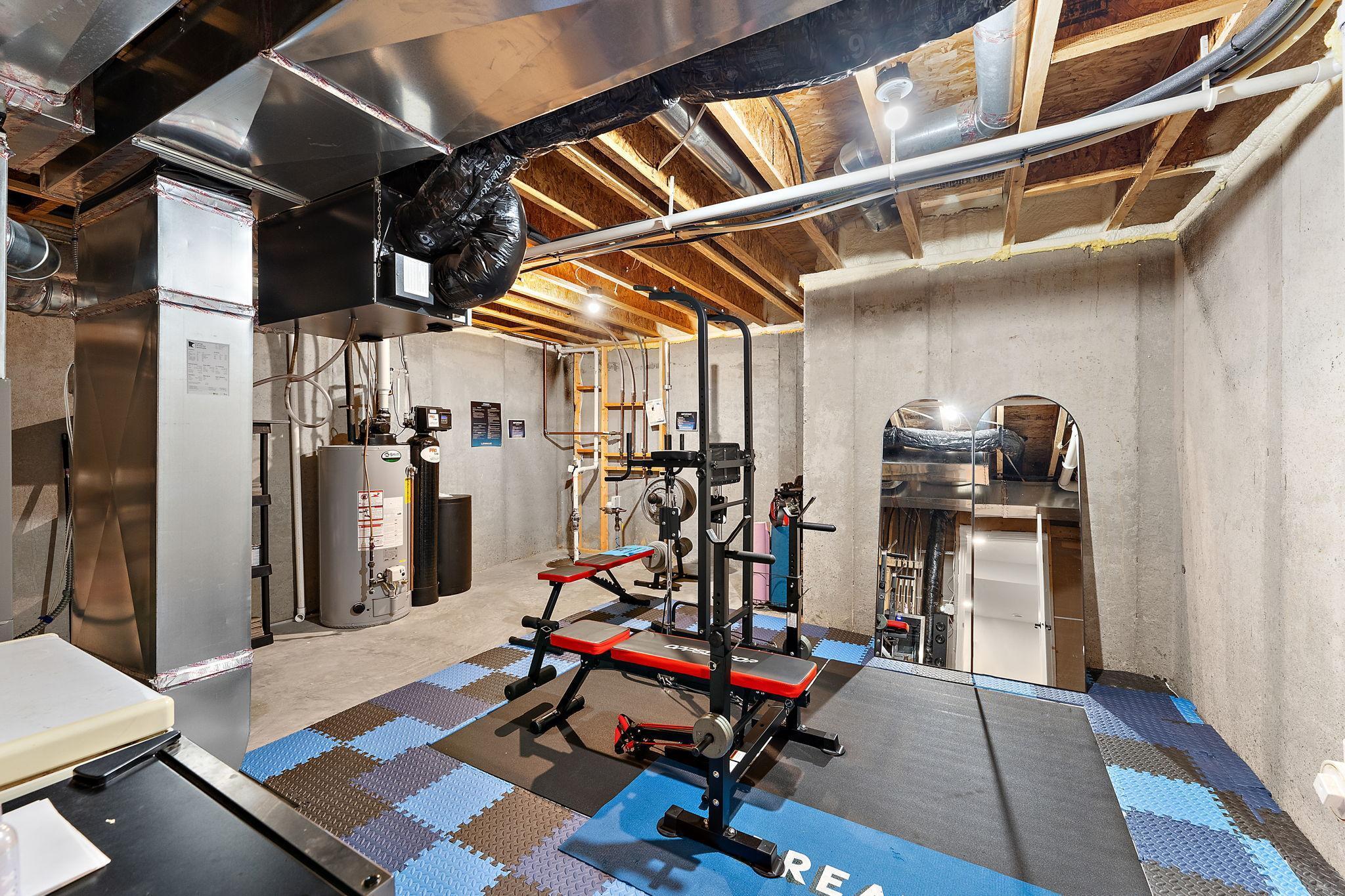 Utility room is wide open with many possibilities for storage