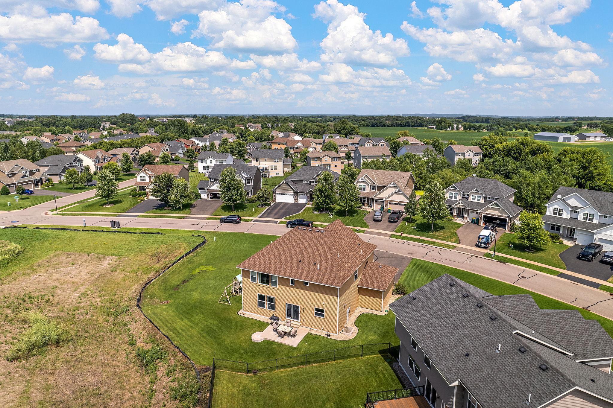 Neighbor's fence on one side, add your own to finish enclosing the yard! Huge side yard, play set included!