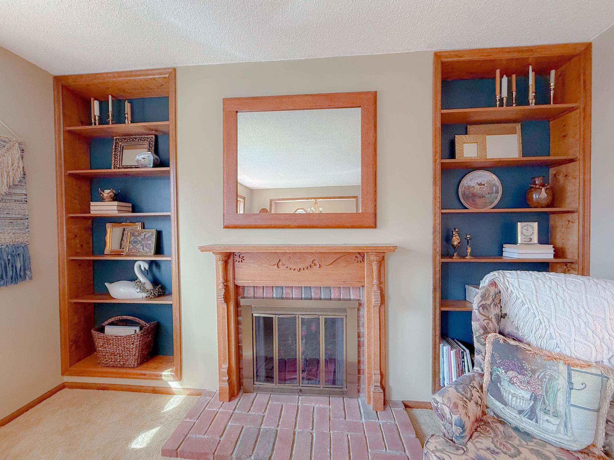 Custom fireplace mantel with custom built-ins