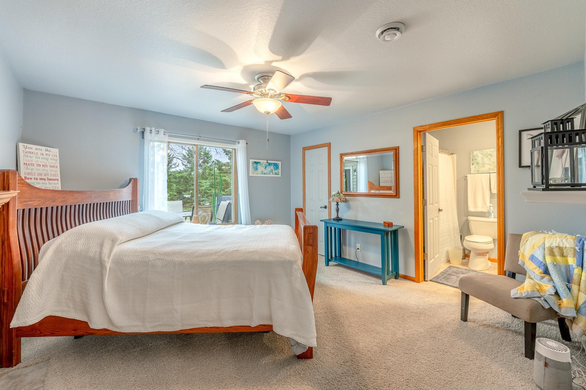 Primary Bedroom with fireplace.
