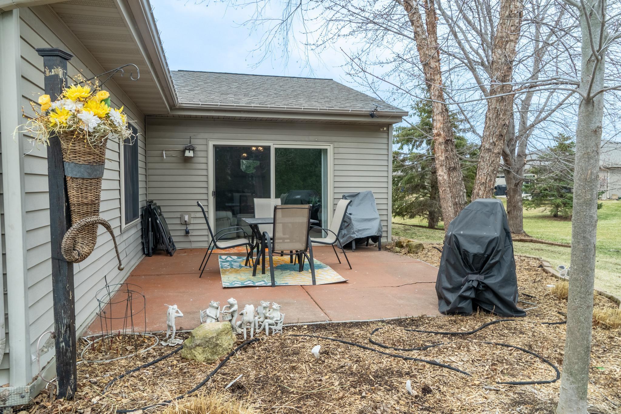 Patio surrounded by perennials