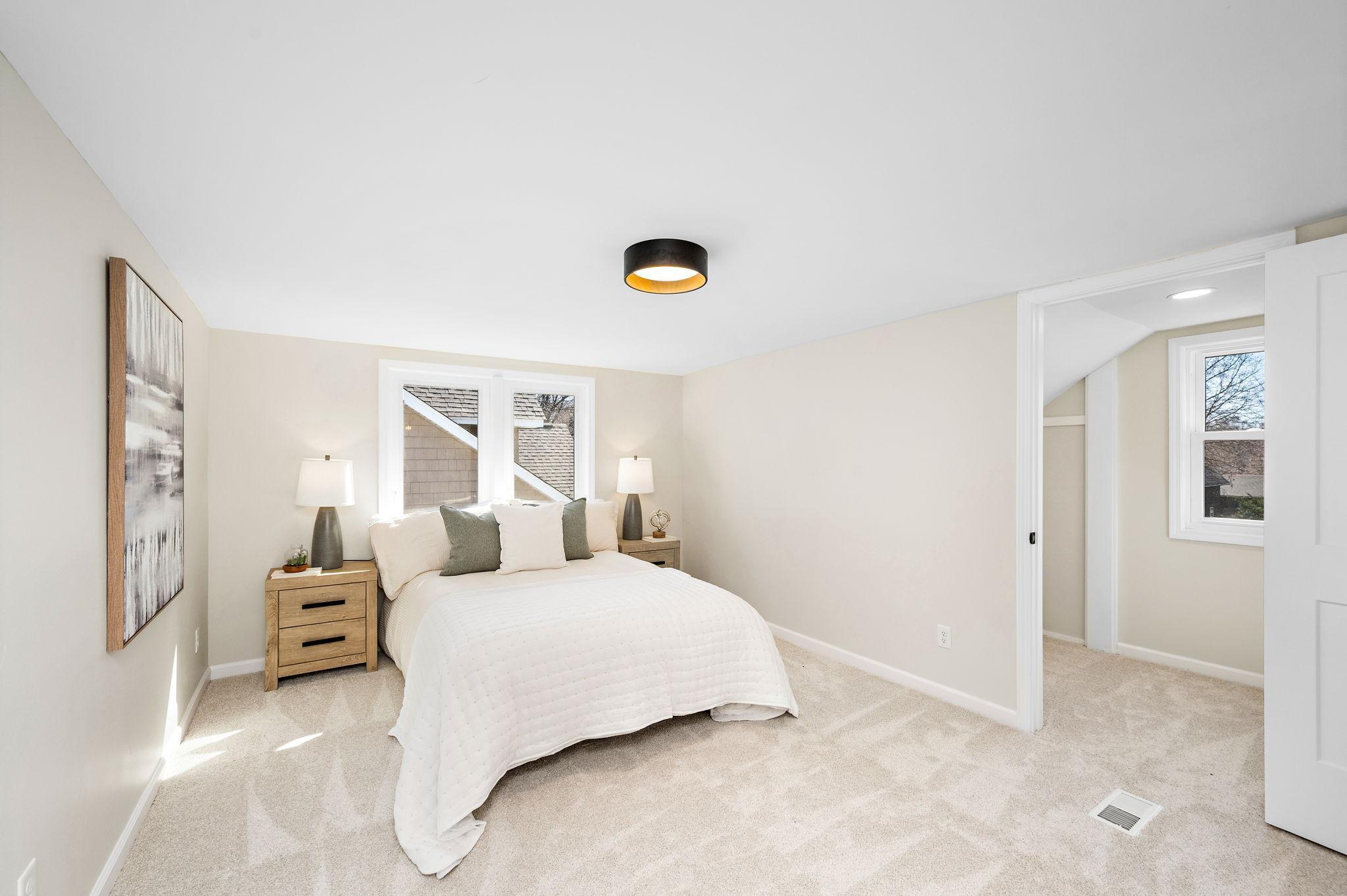 Large upper level primary suite with walk in closet and a secondary closet. 4453 44th Ave S, Minneapolis, MN 55406