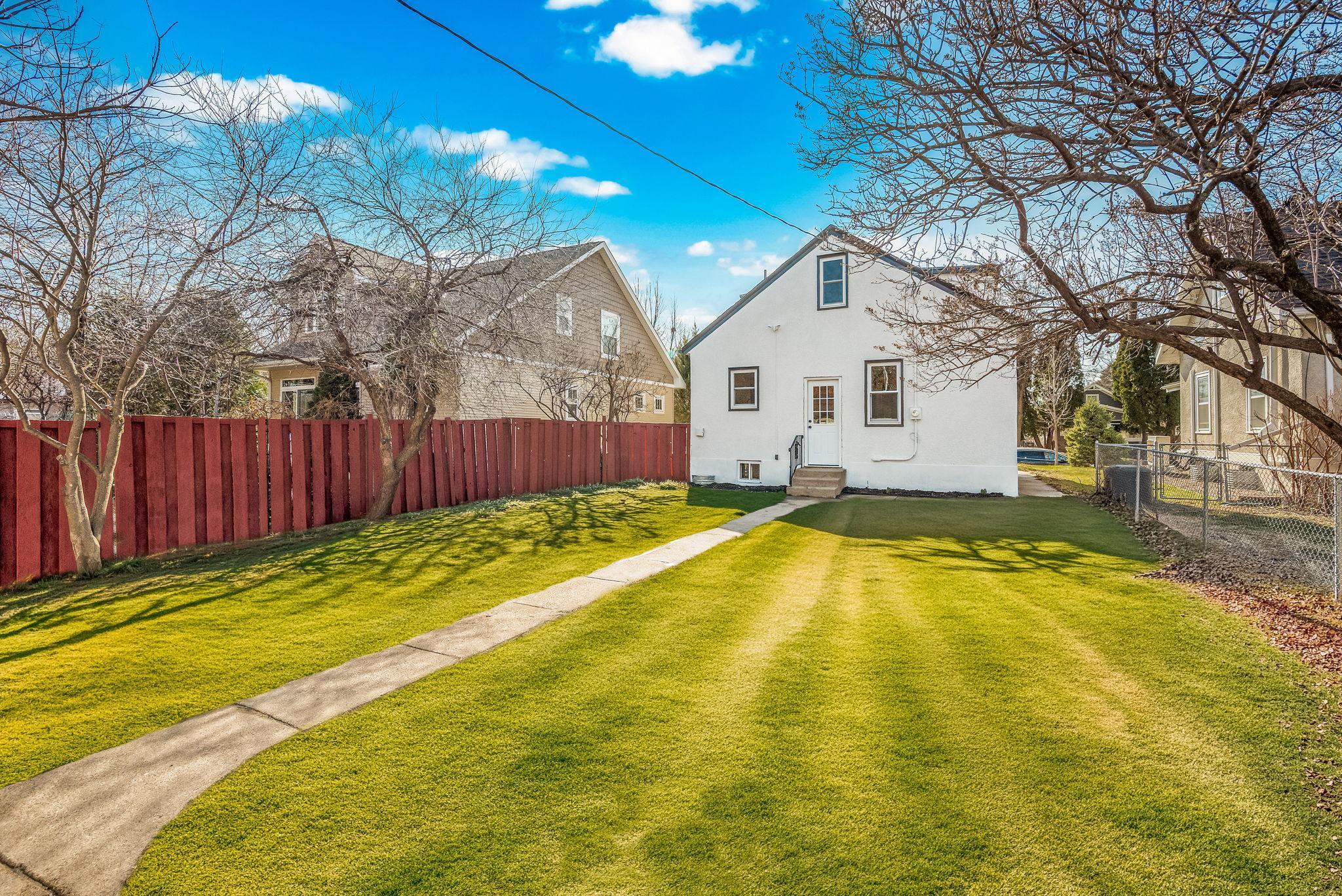 Digitally enhanced to show the future yard after seeding.