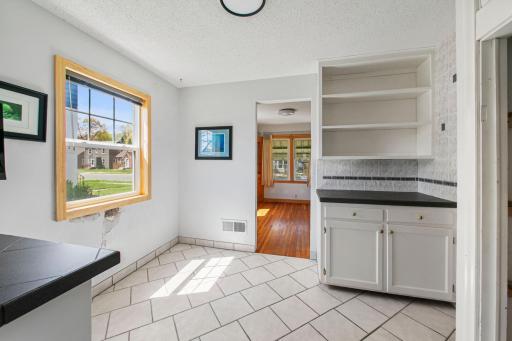 The dinette also has extra counter space area with cabinetry