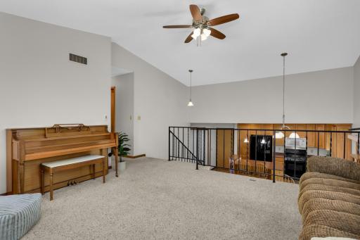 Upper level with kitchen view to provide connectedness..