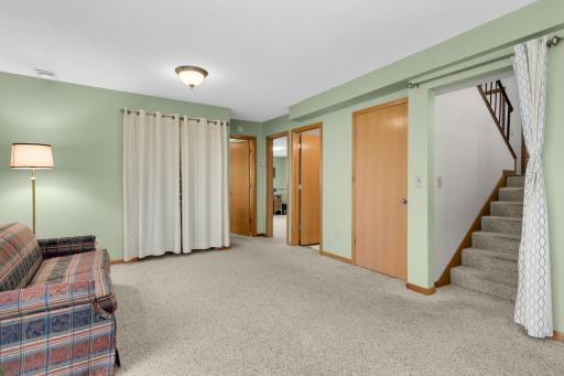 Located at the bottom of stairs with direct access to basement, full bath & 2 additional bedrooms.