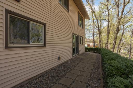 Charming paver walkway around the perimeter of the home.