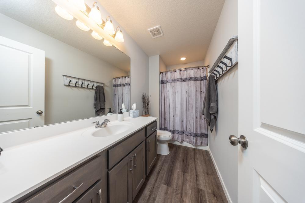 Large, full primary bathroom