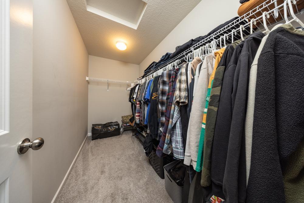 Huge walk-in closet in the primary bedroom