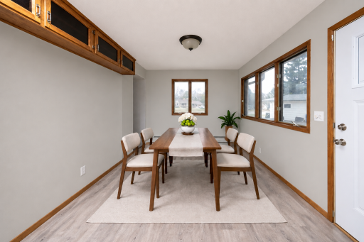 Tons of natural light in the dining room. Virtually staged photo
