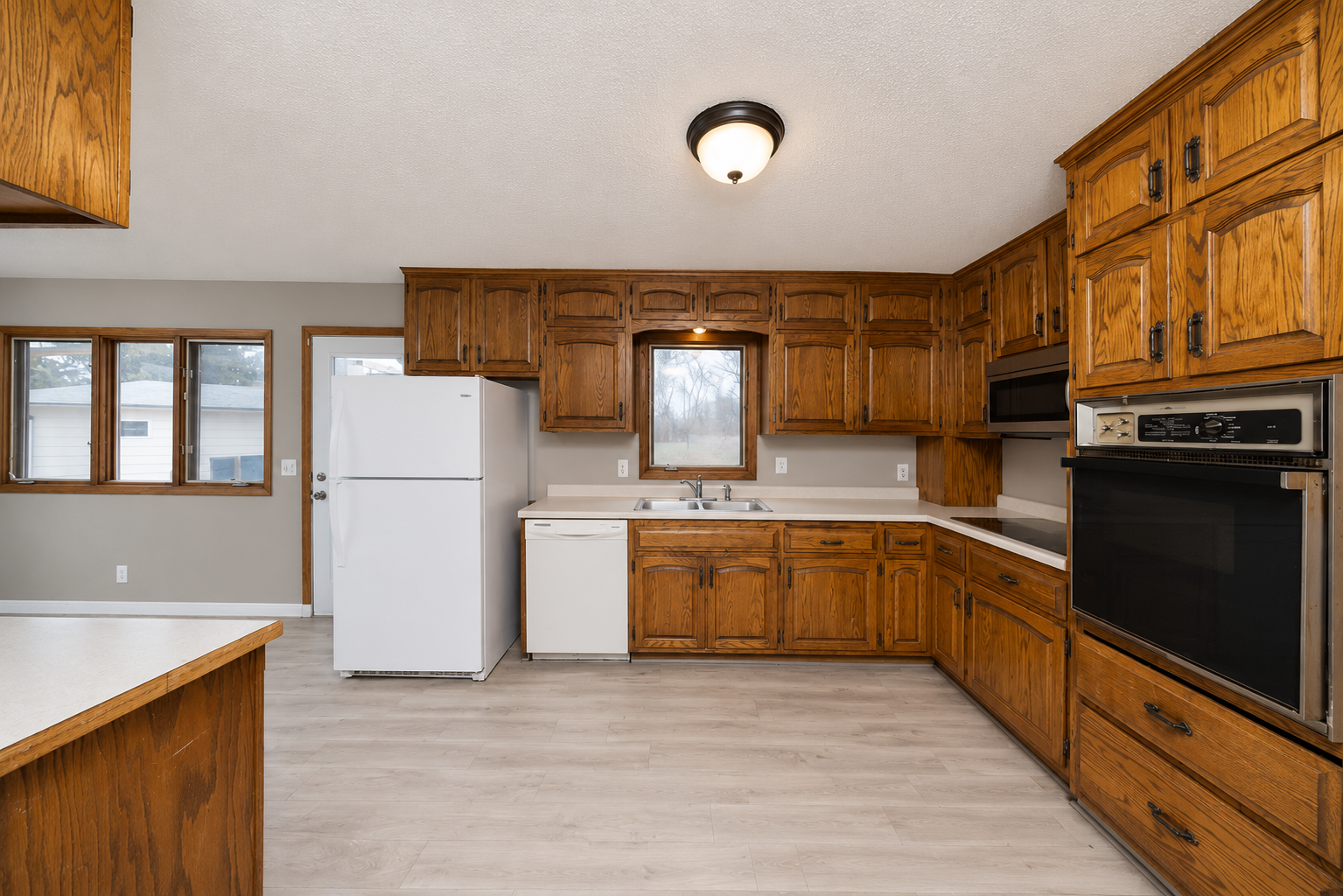 Lots of cabinet space in this sun filled kitchen