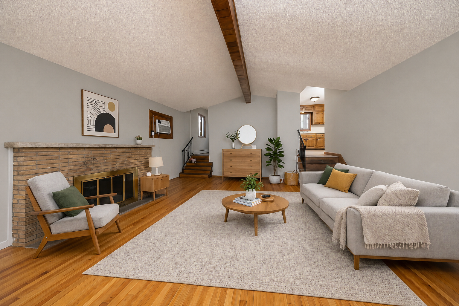 Spacious living room features a vaulted ceiling. Virtually staged photo