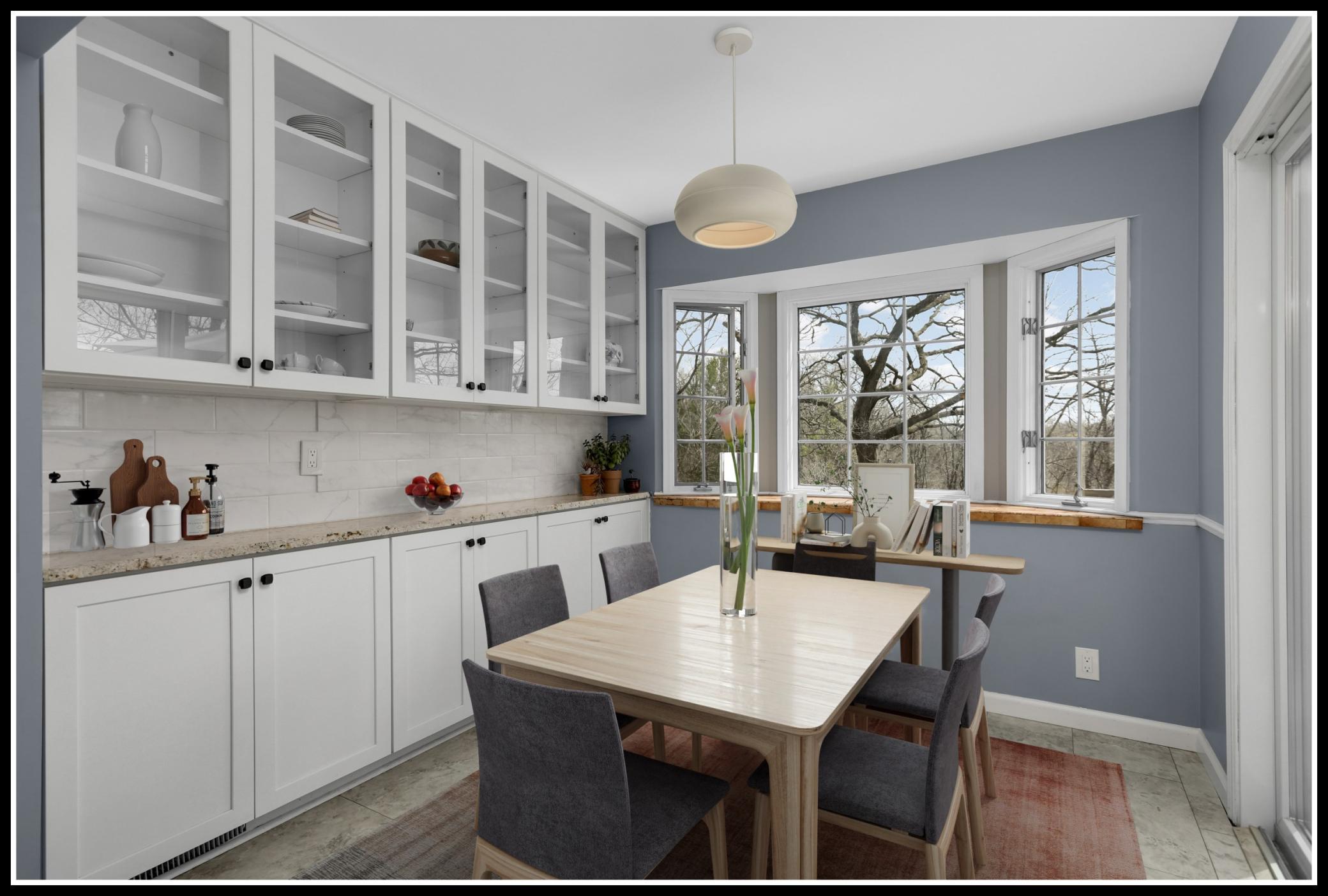 Built-ins offer additional storage and serving space in the dining area (virtually staged)