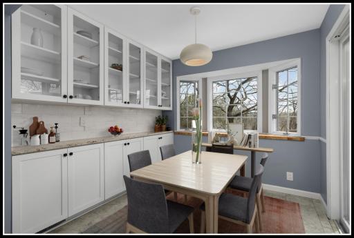 Built-ins offer additional storage and serving space in the dining area (virtually staged)