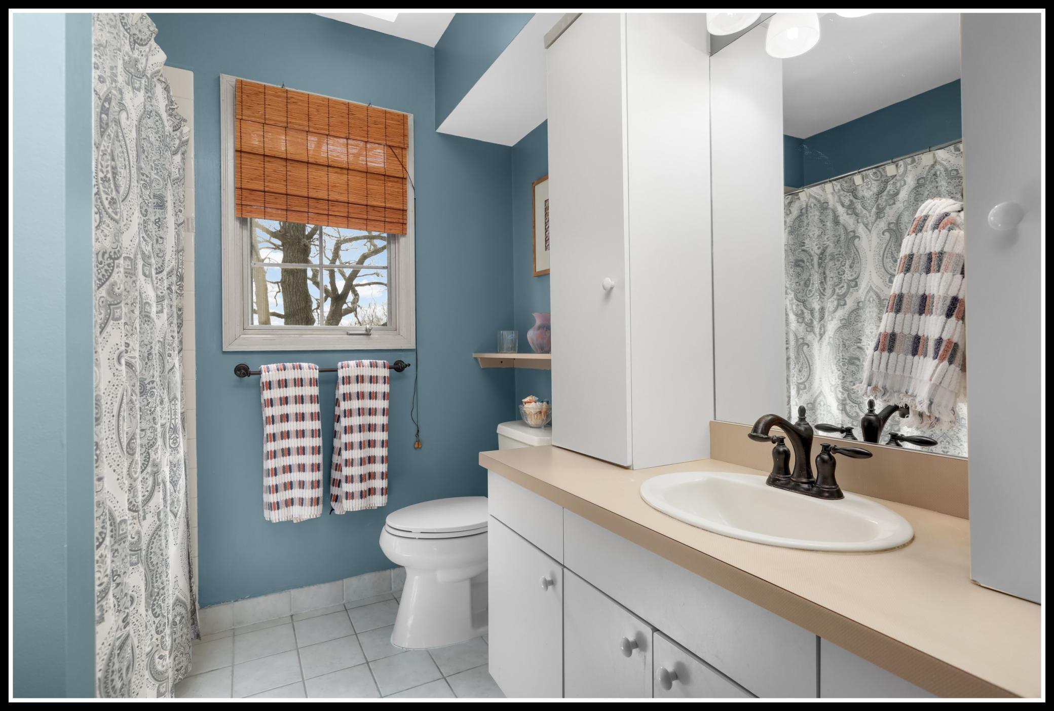 A full bathroom serves the main level