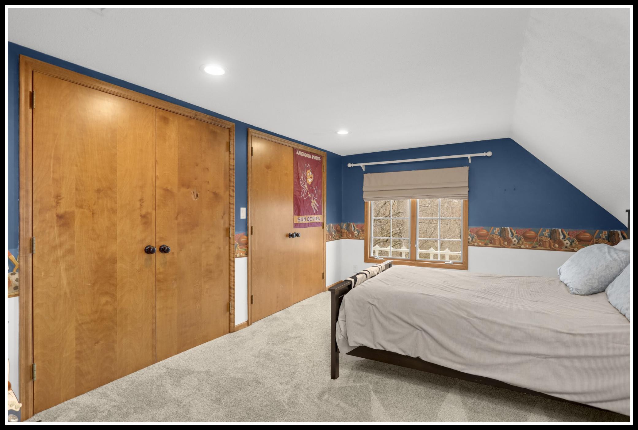 Second bedroom on the upper level with double closets