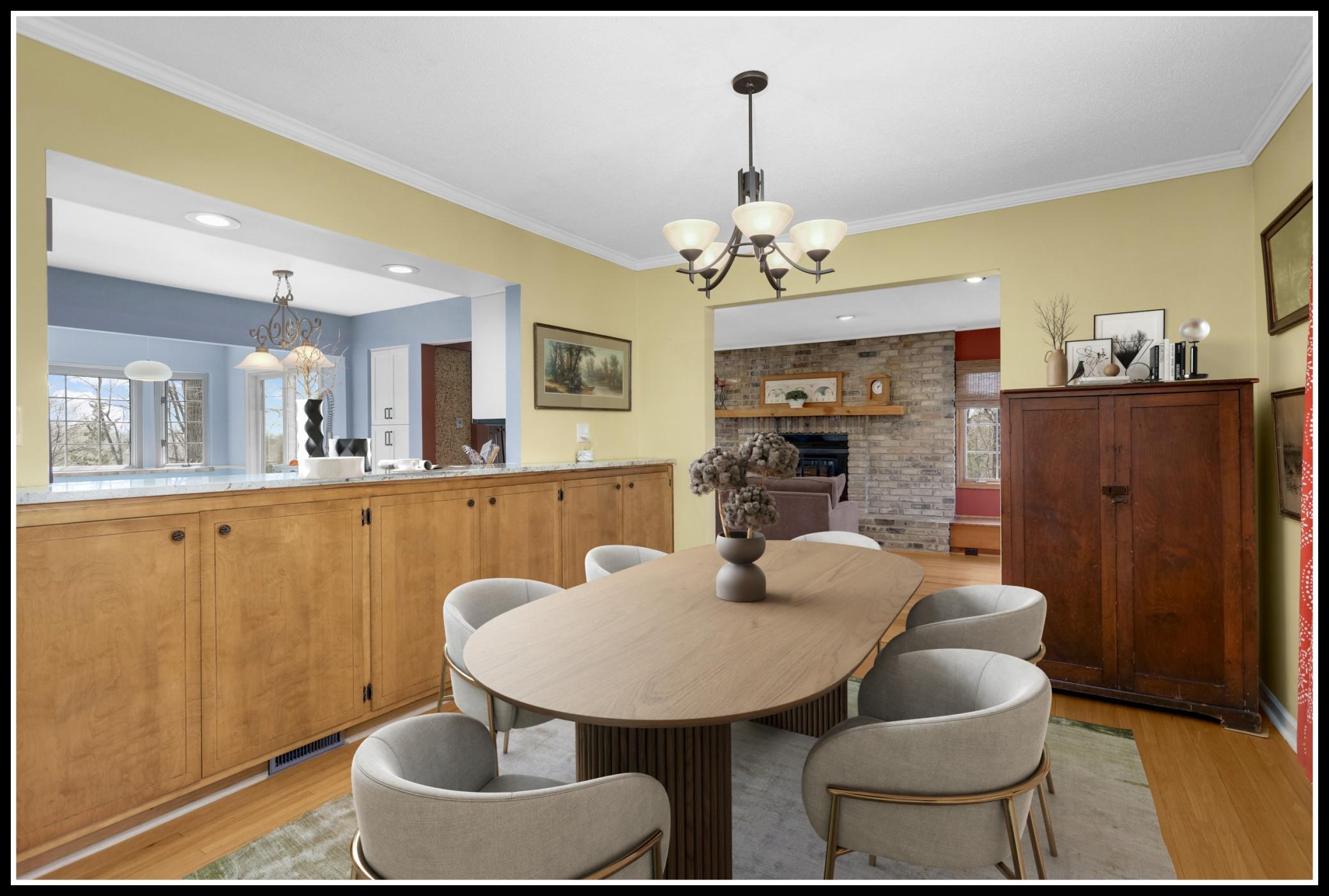 Dining room with pass-through access to the kitchen (virtually staged)