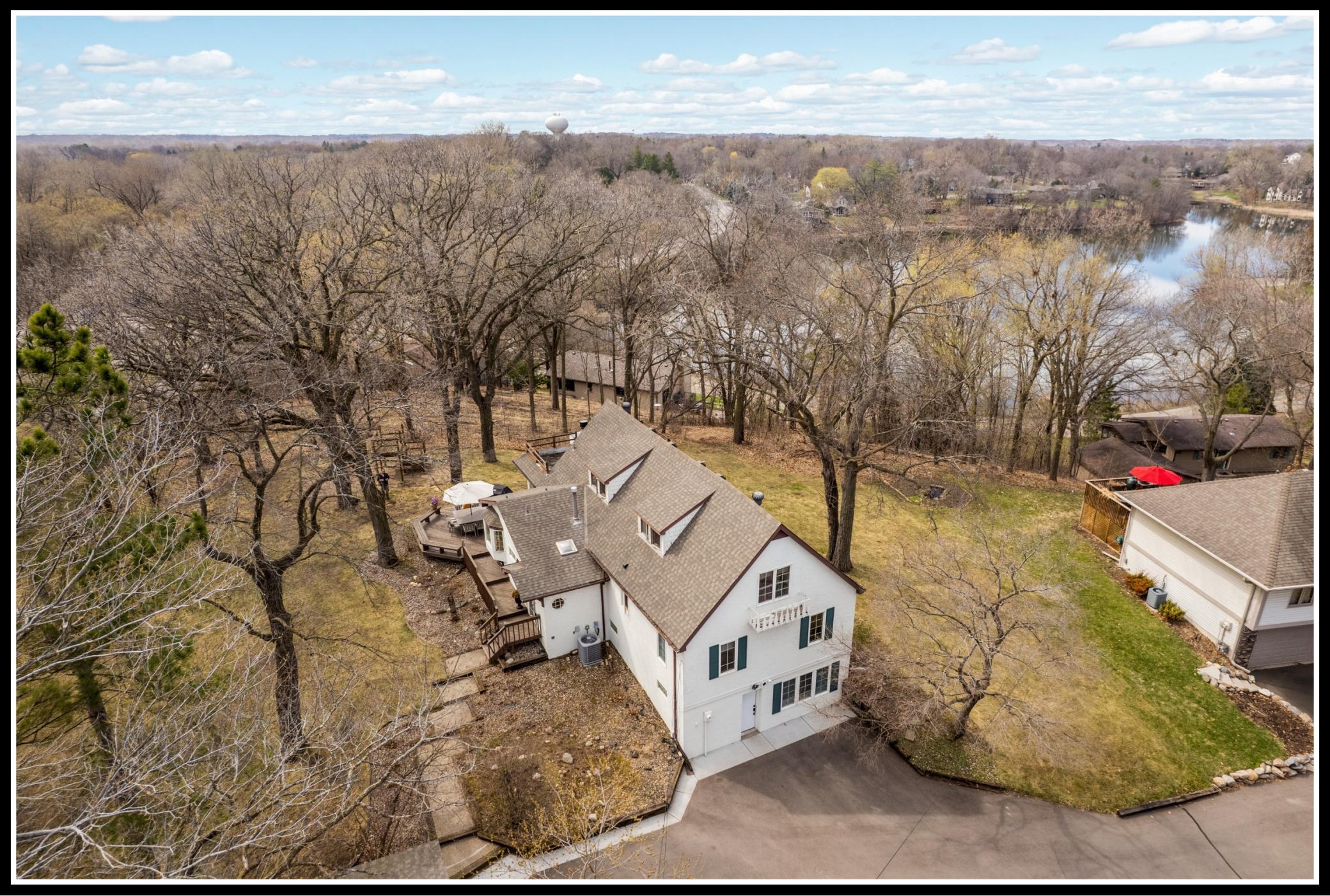 Situated on a bluff, the property has a treehouse-like feel with views of Wing Lake