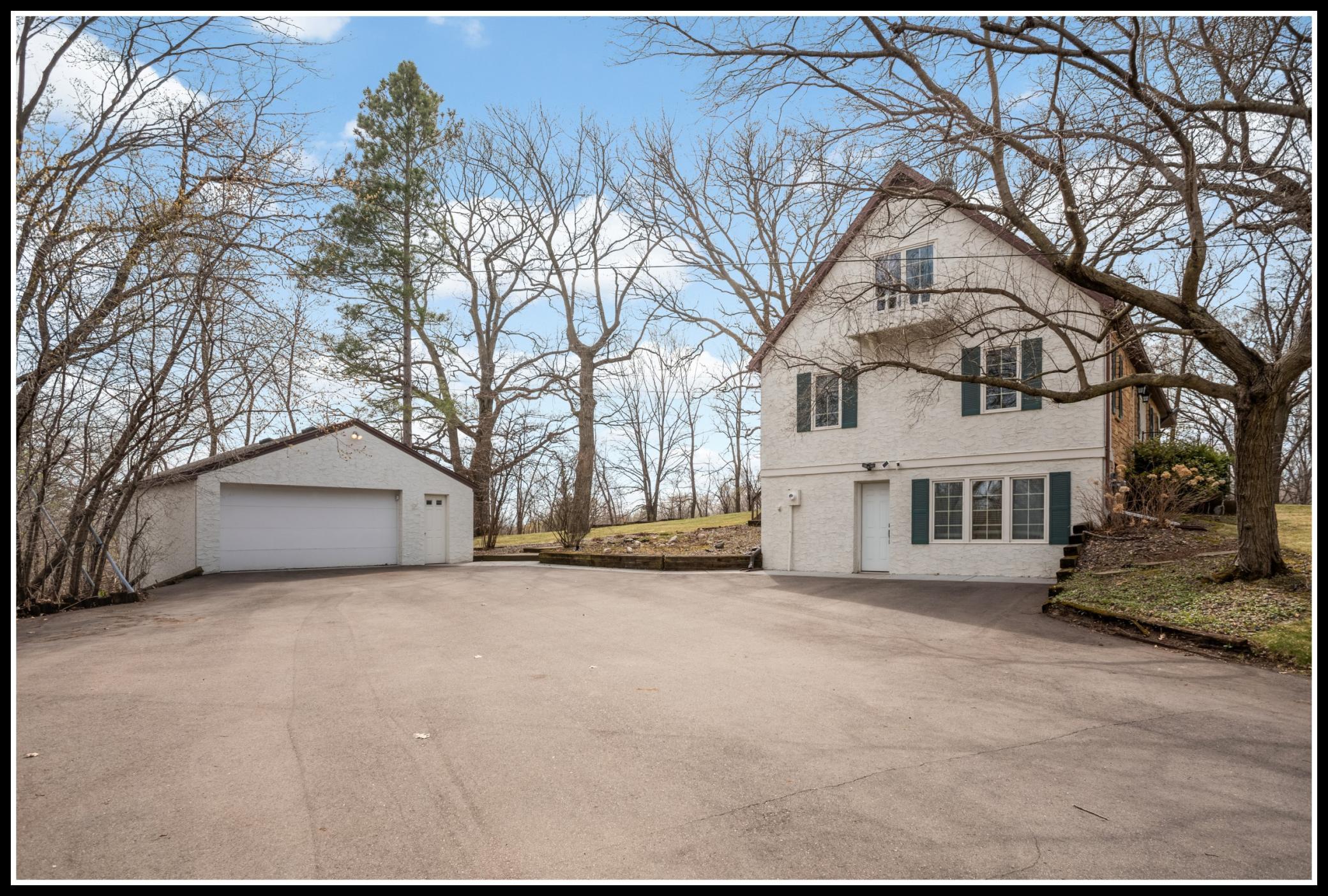 The extra wide garage parks two cars with room to spare for storage or work space