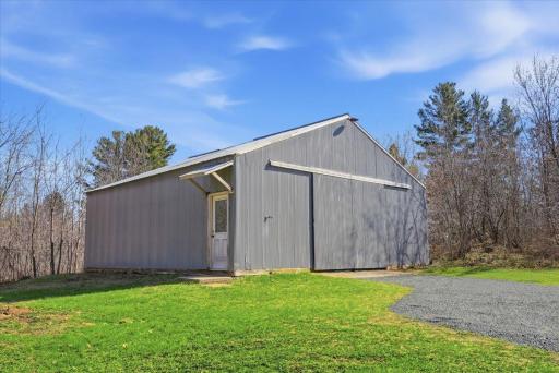 Spacious pole barn for added storage and workspace.