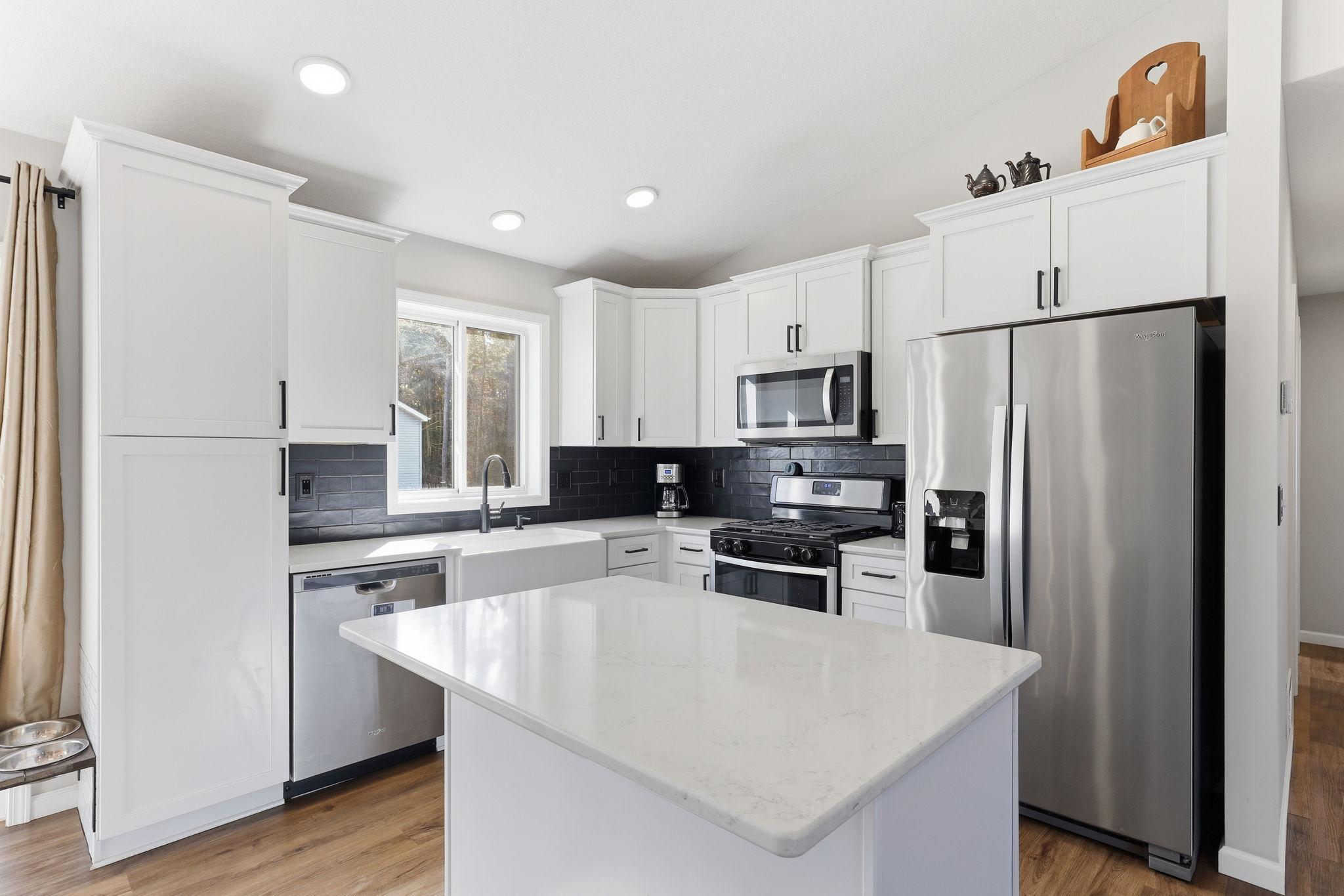 Center Island with Snack Bar, Split Pantry, Stainless Applances!