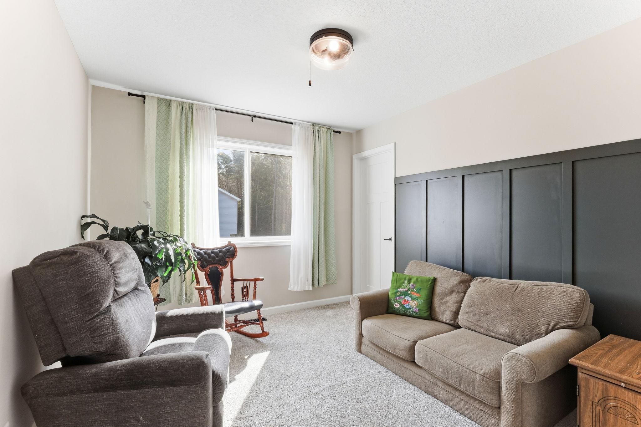 Upper Level Bedroom Two features Walk-In Closet!