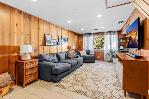 The lower level has so many wonderful features as well. The newer ceilings and lighting, along with the large windows, give this level of the home a bright and open feel.