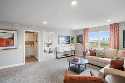 Loft on upper level, another view. Photo of prior model home, colors and finishes will vary.