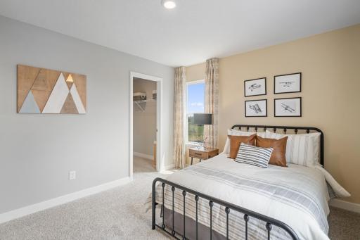 Upper level bedroom 4, another view. Photo of prior model home, colors and finishes will vary.