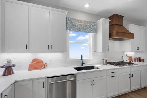 Large window to let in natural light to the kitchen.