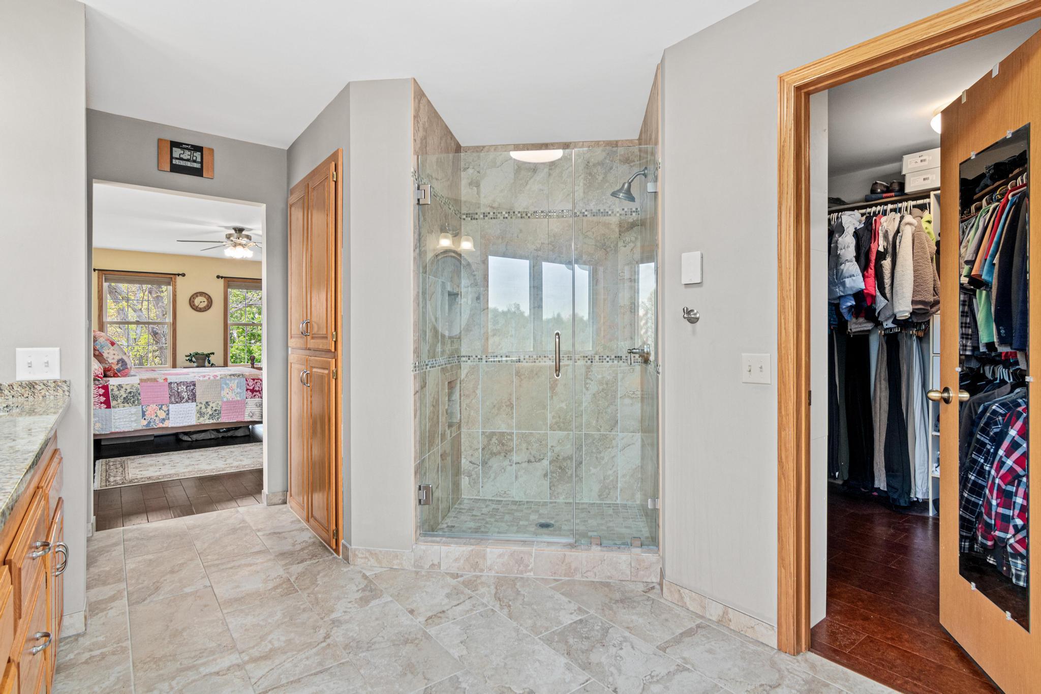Gorgeous walk-in shower, the walk-in closet is the size of a small bedroom! The picture does not do it justice~Come and see!