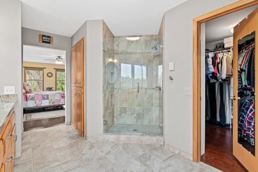 Gorgeous walk-in shower, the walk-in closet is the size of a small bedroom! The picture does not do it justice~Come and see!