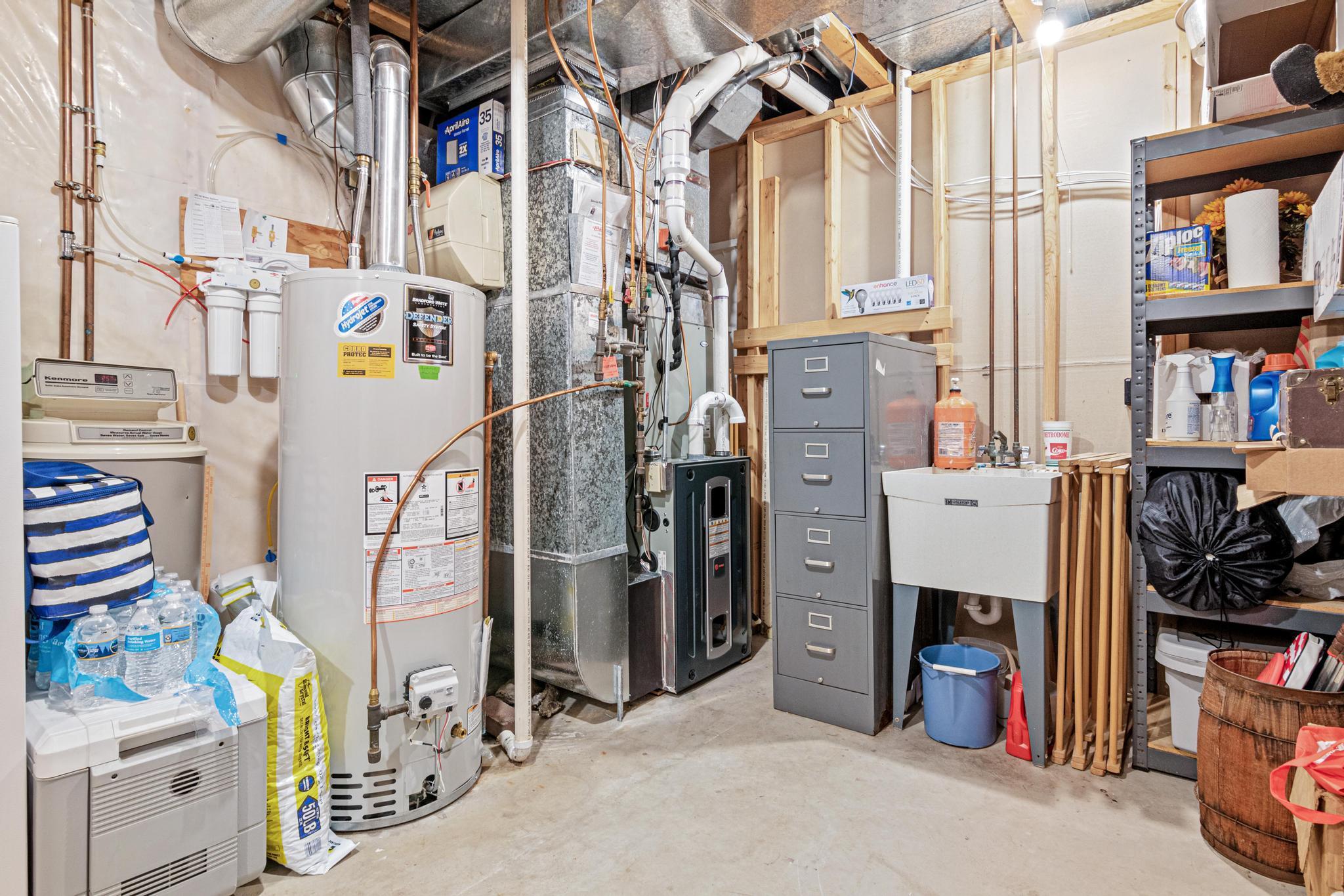 Well-maintained and newer mechanicals! A Lot of storage in this utility room! So clean it shows like new!