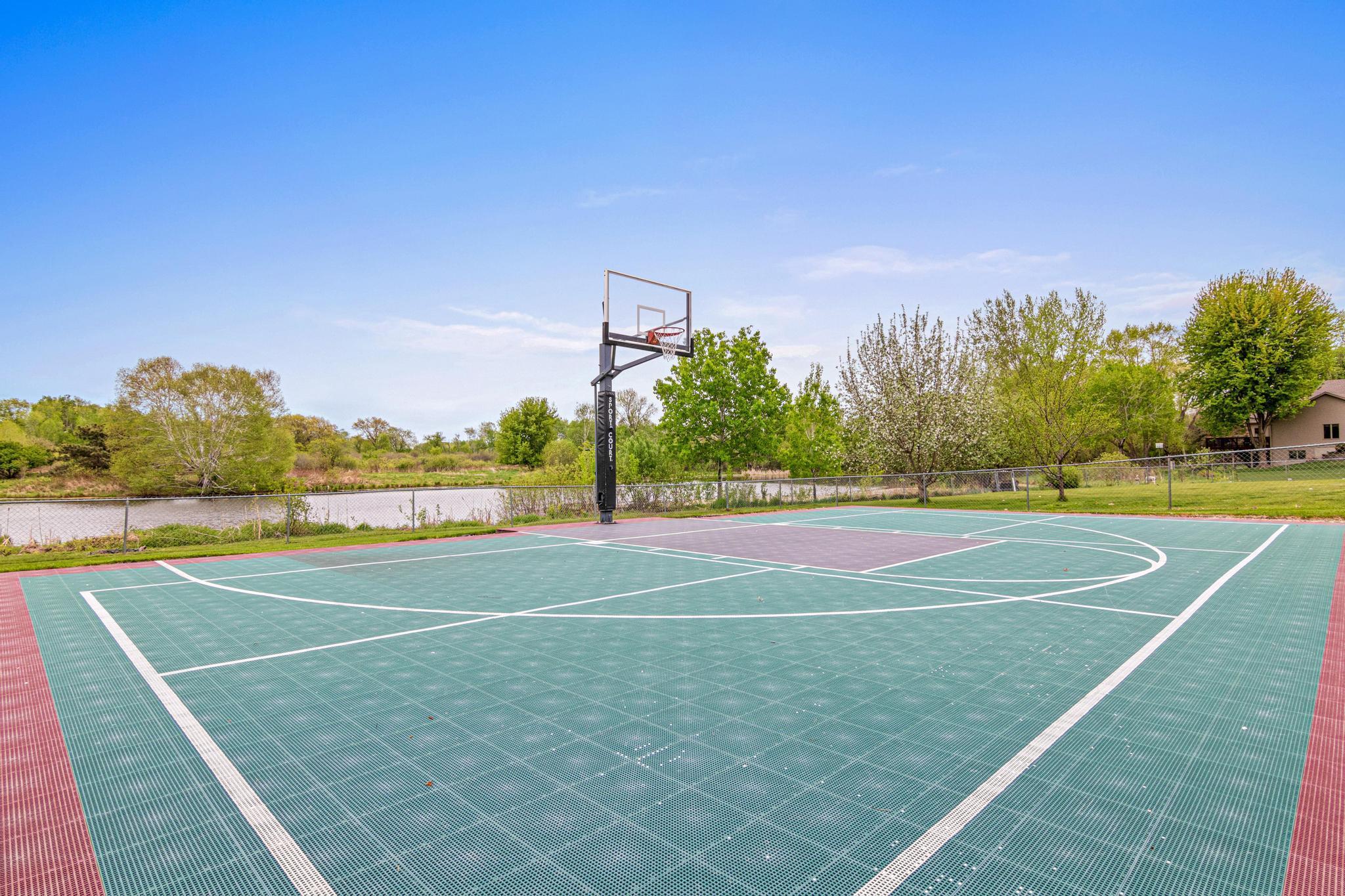 Fantastic sports court measures 50x30!! Fun for all ages, from balls to riding toys! Comes with a tennis/PB net, shuffleboard, tetherball, mount net at 2 different levels!