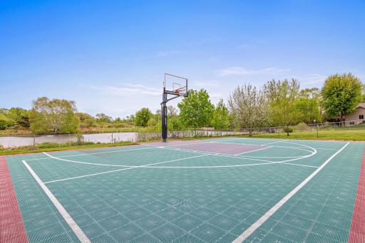 Fantastic sports court measures 50x30!! Fun for all ages, from balls to riding toys! Comes with a tennis/PB net, shuffleboard, tetherball, mount net at 2 different levels!