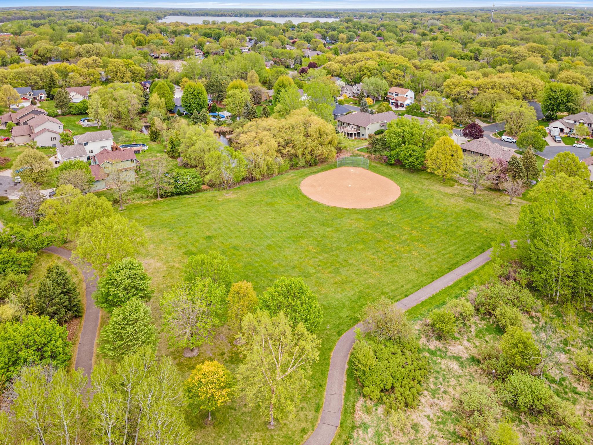 Secluded field for softball and baseball lovers - There is a playground in this area as well, secluded by the trees! This hidden gem is only accessible via trails! There are miles of trails to explore via hike or ride!