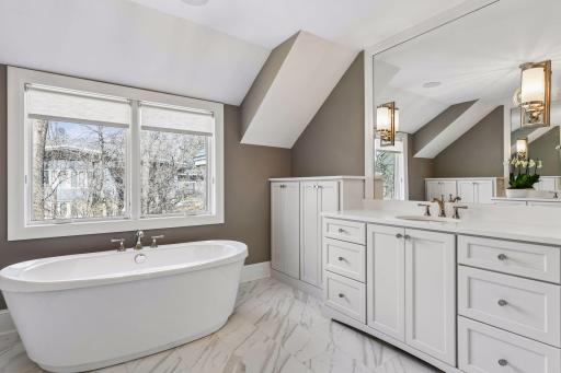 Each vanity has a large counter area with an abundance of storage