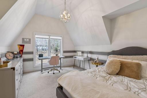 The fourth bedroom measures 15x12 and has a vaulted ceiling