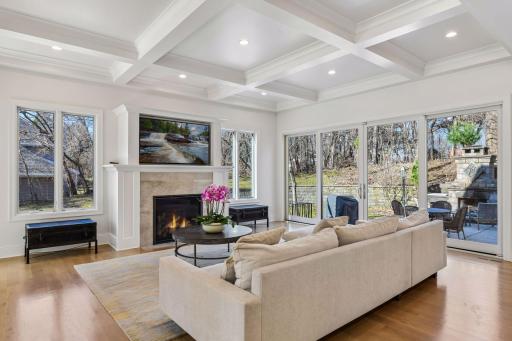The living room has a gas fireplace with an entertainment niche above