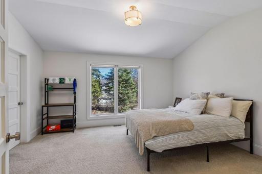 The third bedroom with its north facing window measures 15x14 and has a walk in closet