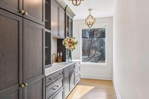 The butler's pantry is just off the kitchen and provides additional storage