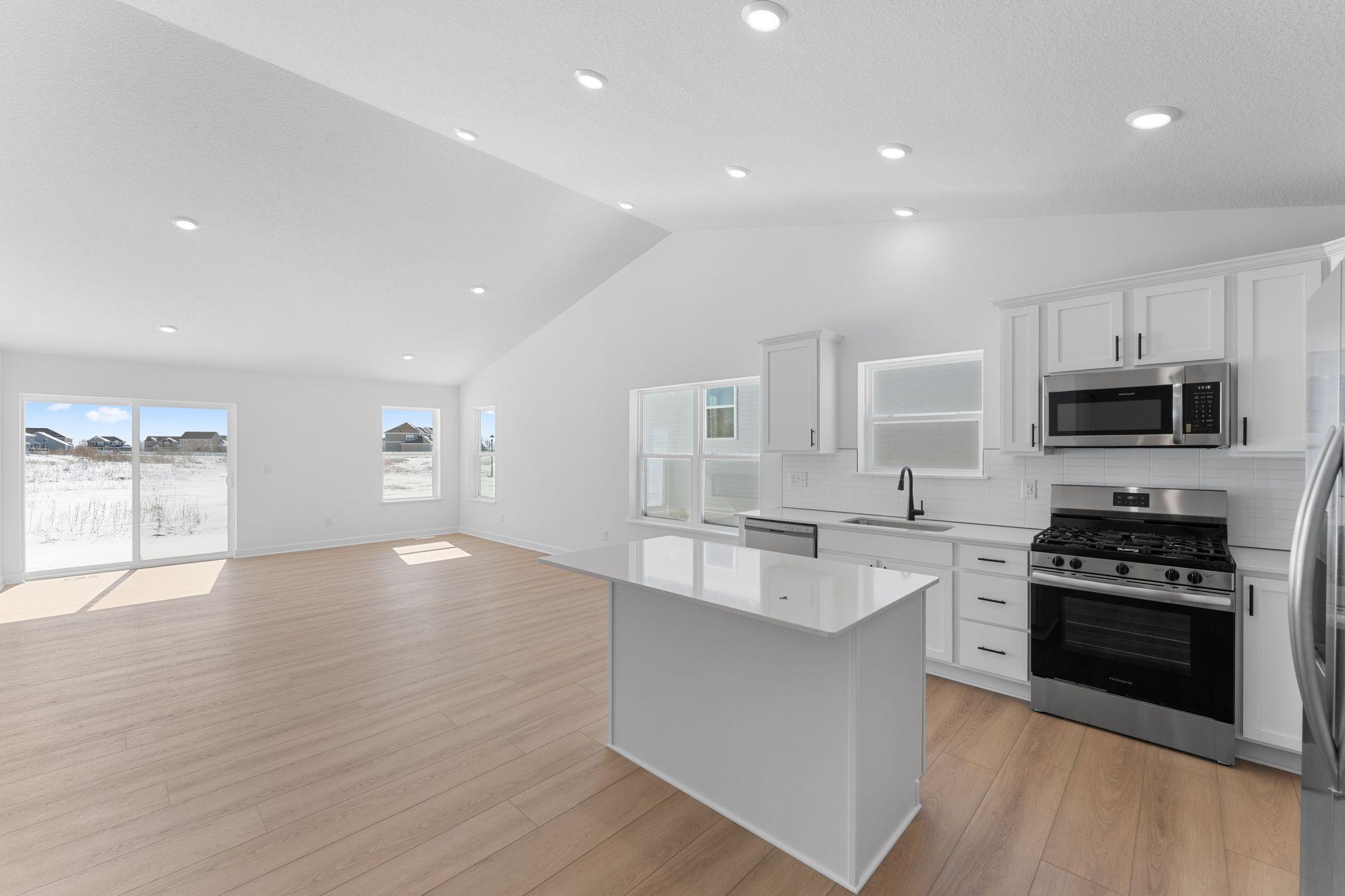 The dining area sits between the kitchen and Great Room and is ready for everything from family meals to game nights.