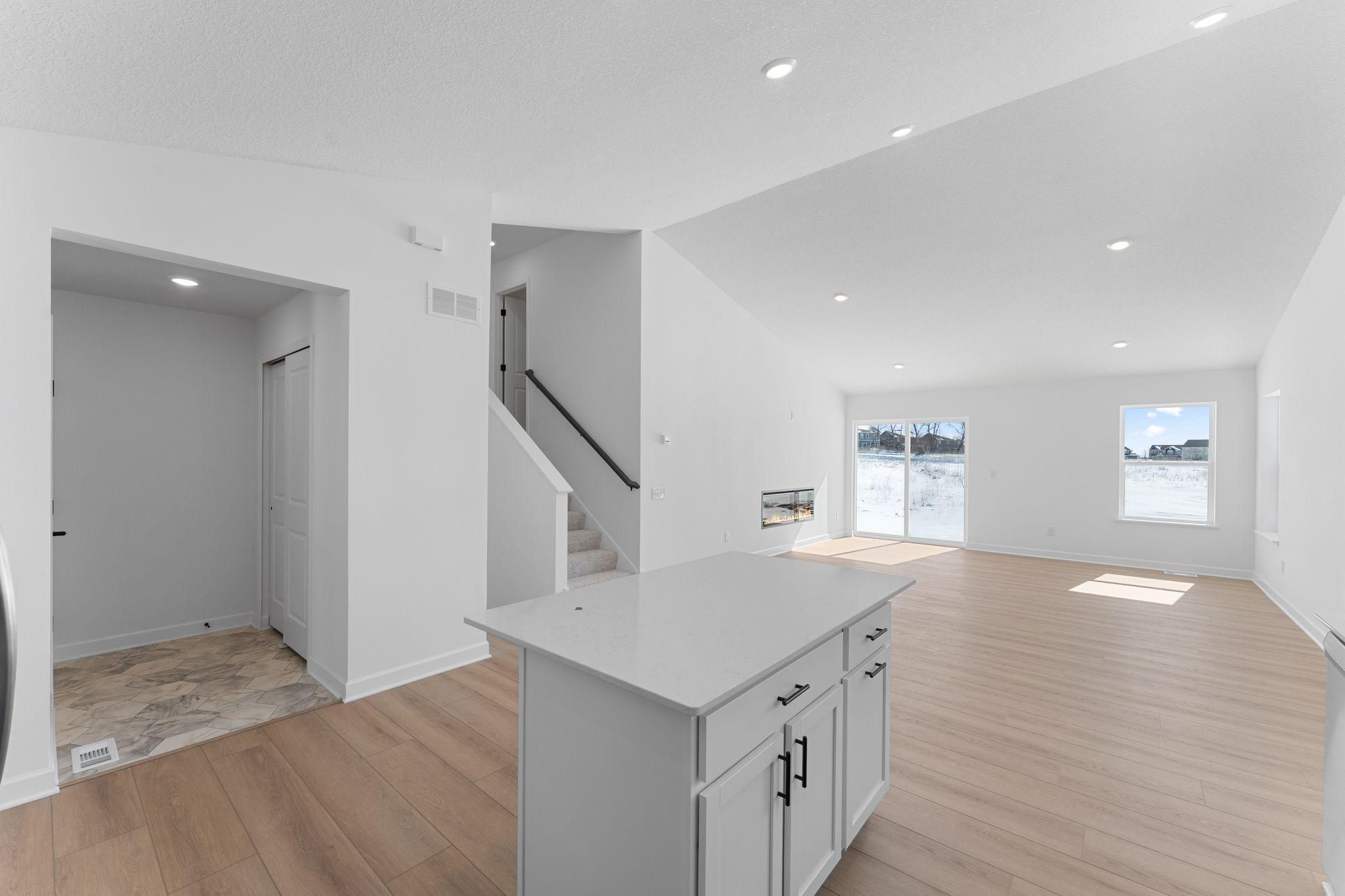 The center island adds additional meal preparation space, and the pull-up seating makes it easy to entertain while cooking