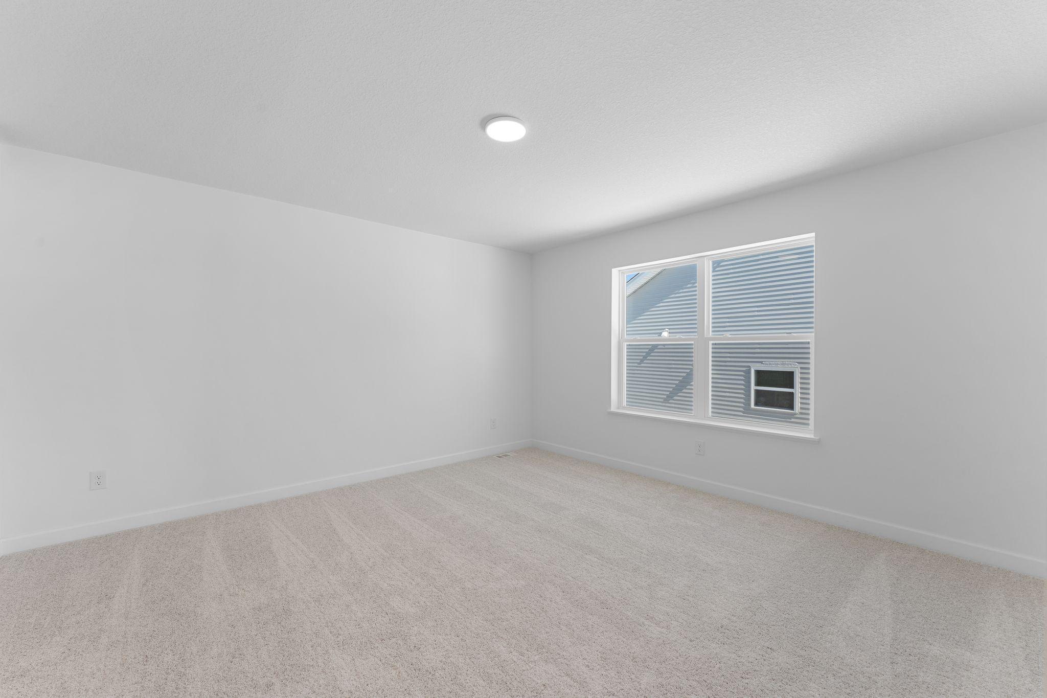 Rest and relaxation await in the owner’s suite, which features a tranquil bedroom, a spa-inspired bathroom and a walk-in closet.