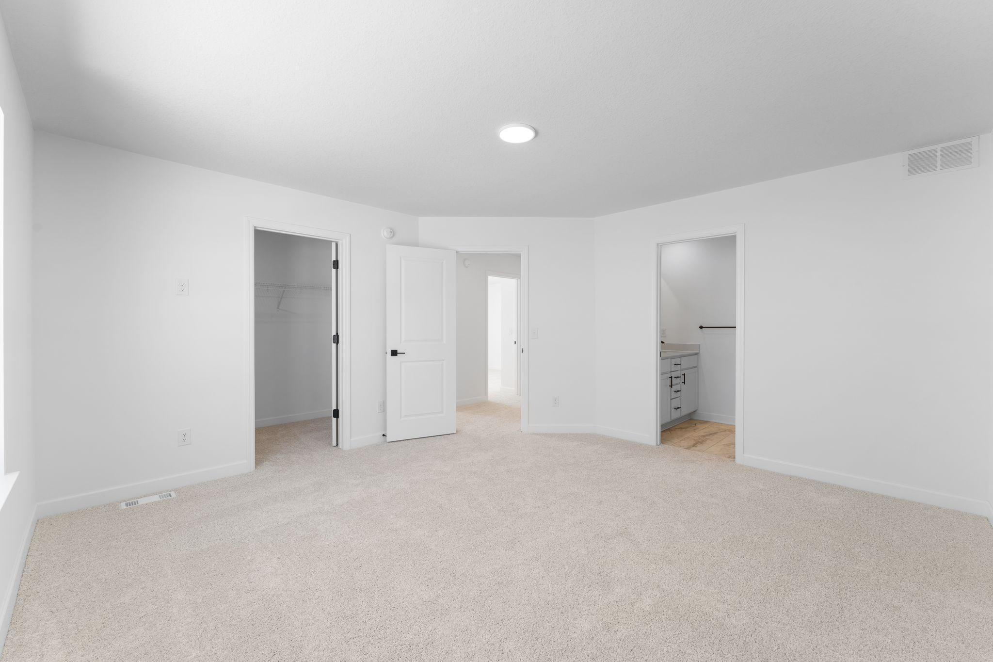 The bedroom has direct access to the private bathroom and closet