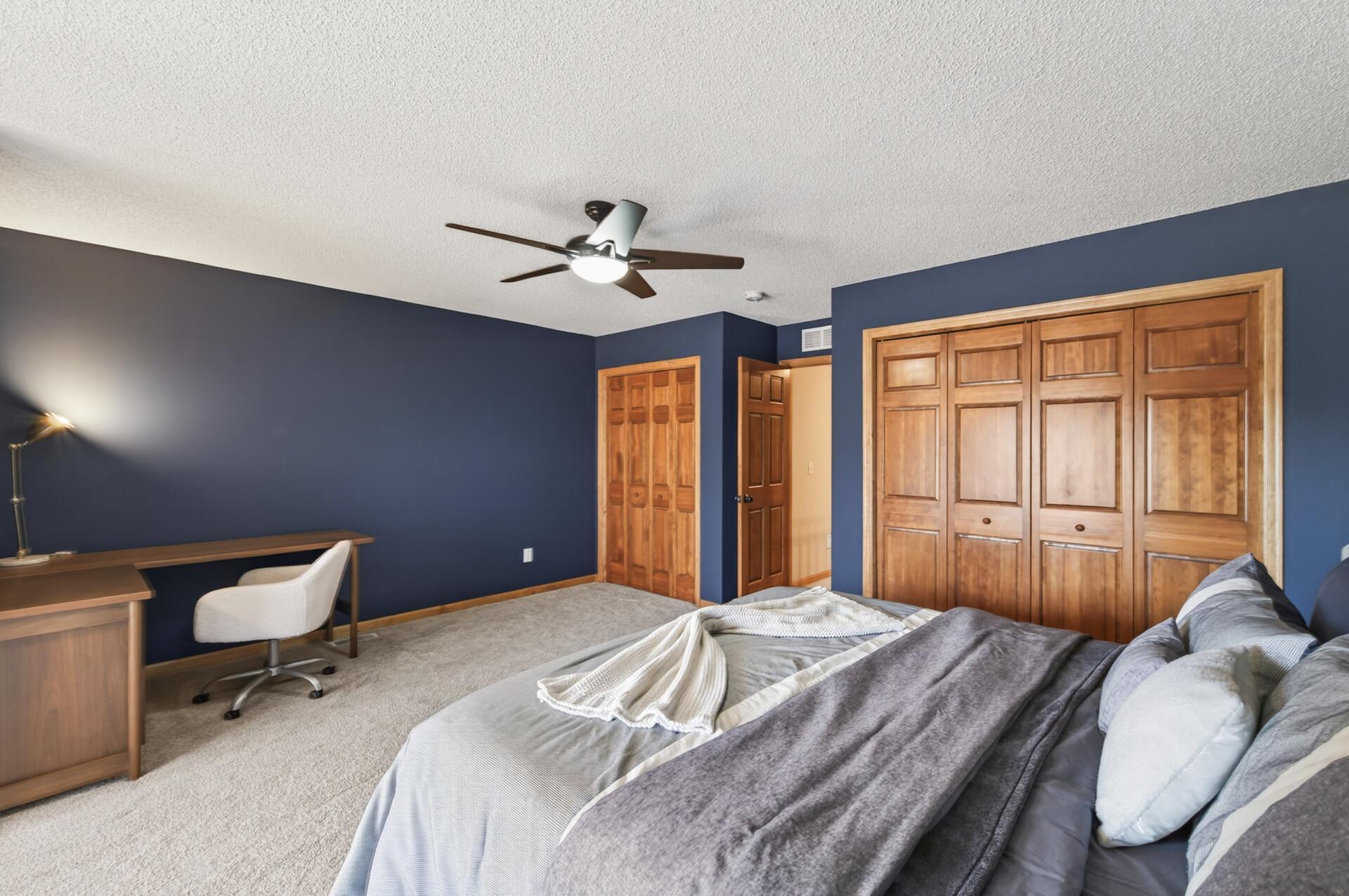 Additional view showcasing ample closet space and a clean, neutral design. A comfortable and versatile room to suit a variety of needs.