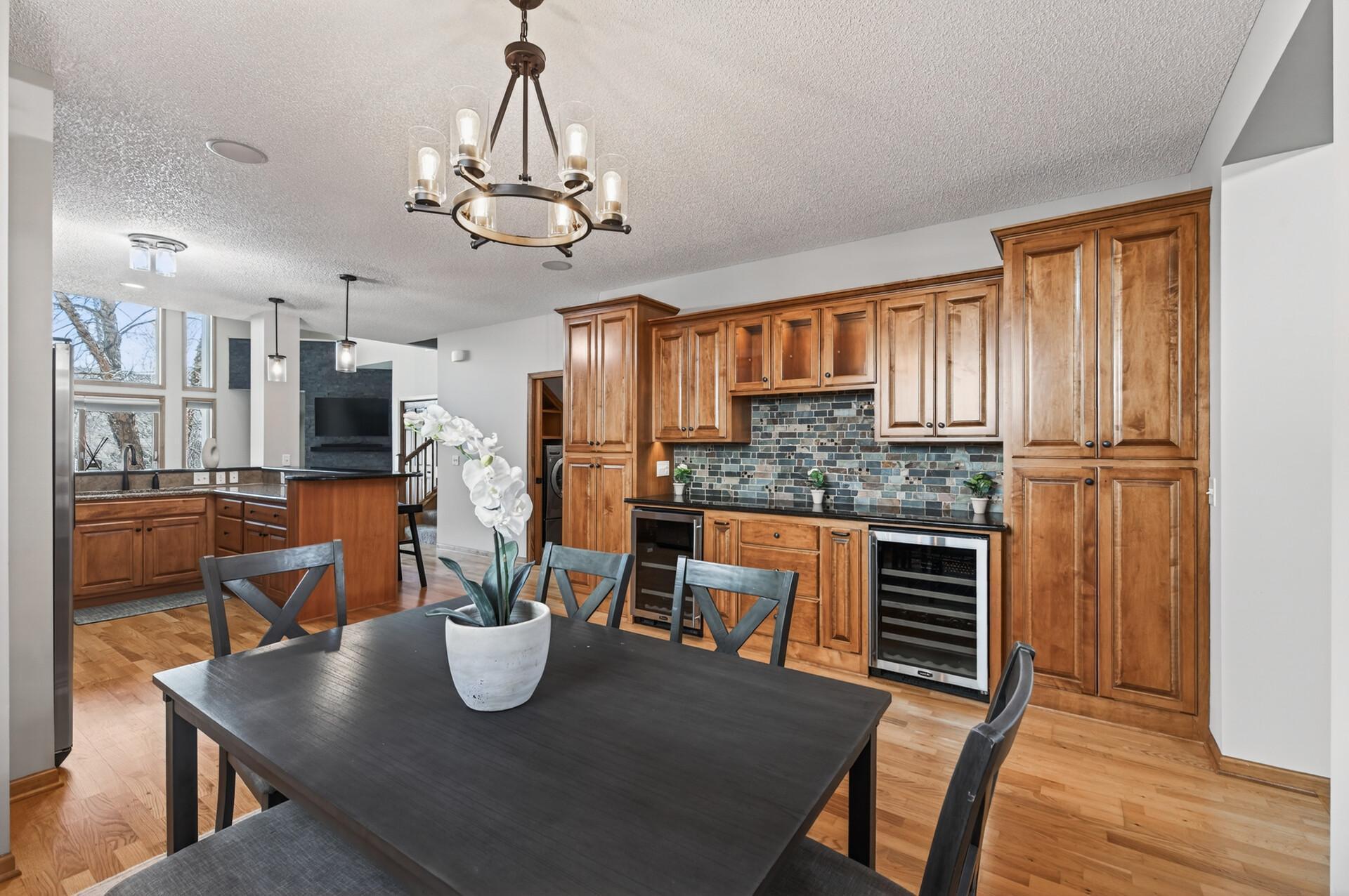 Thoughtfully designed kitchen layout with wraparound counters and ample storage. Perfect for cooking, entertaining, and staying connected to the main living areas.